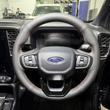 Ford Ranger / Everest Next-Gen (2022+) Steering Wheel Wrap – Black Leather (smooth top, perforated sides), Orange stitch