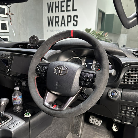 Toyota HiLux 8th Gen Steering Wheel Wrap – Black Alcantara, Red stitch, Red Alcantara Marker