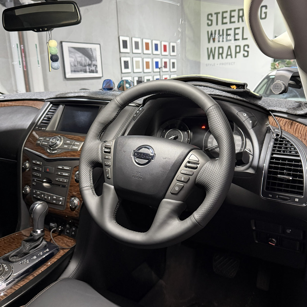 Nissan Patrol Y62 Steering Wheel Wrap – Black Leather (smooth top, perforated sides), Black stitch