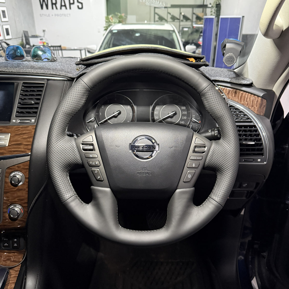 Nissan Patrol Y62 Steering Wheel Wrap – Black Leather (smooth top, perforated sides), Black stitch