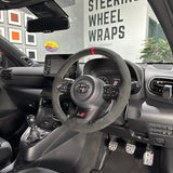 Toyota GR Yaris (2020-2025) Steering Wheel Wrap – Black Alcantara top / Black Alcantara Perforated sides, Wine Red stitch, Red Leather marker, Paddles