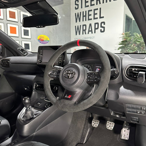 Toyota GR Yaris (2020-2025) Steering Wheel Wrap – Black Alcantara top / Black Alcantara Perforated sides, Silver stitch, Red Alcantara marker