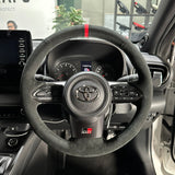 Toyota GR Yaris (2020-2025) Steering Wheel Wrap – Black Alcantara top / Black Alcantara Perforated sides, Wine Red stitch, Red Leather marker, Paddles