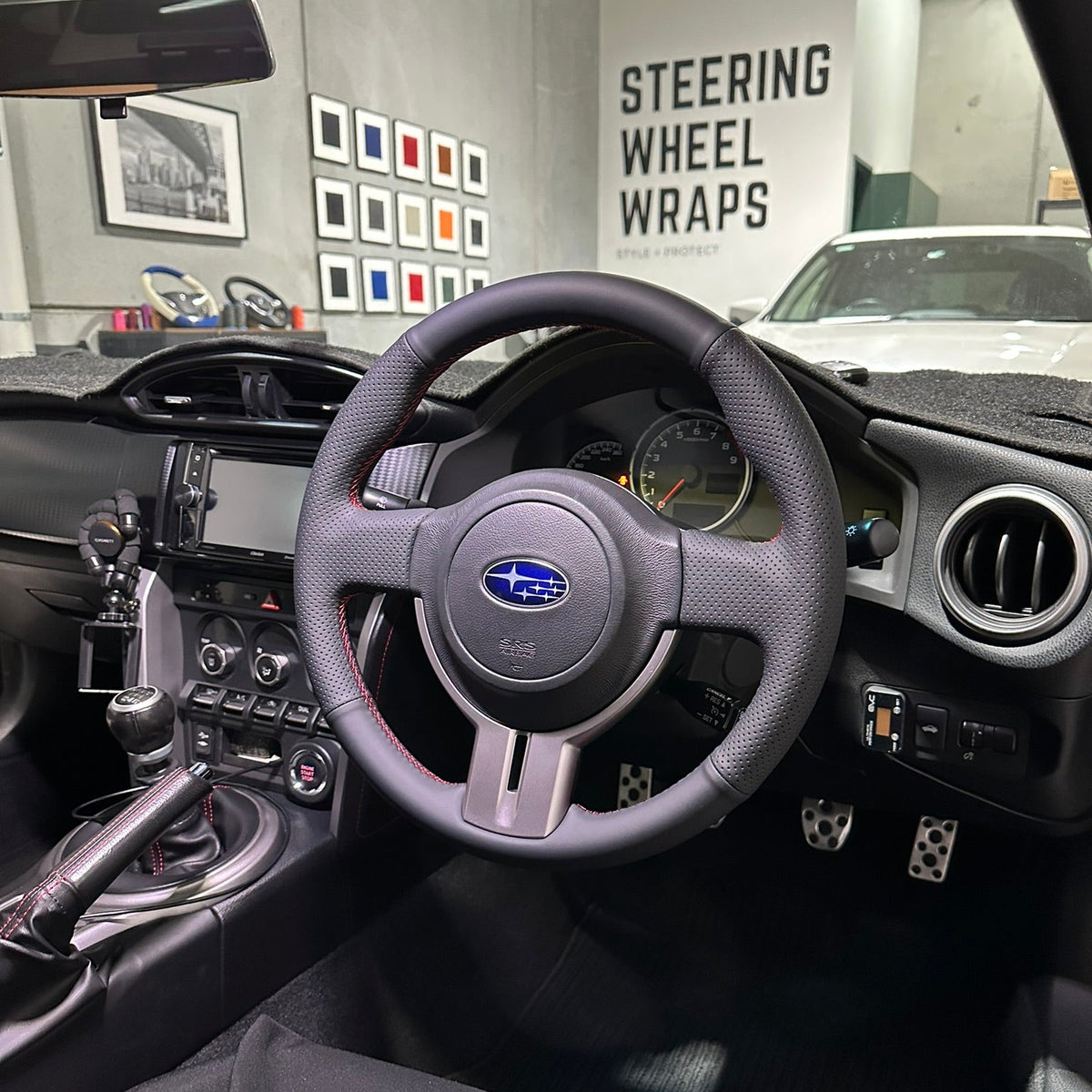 Toyota 86 / Subaru BRZ (2012–2021) Steering Wheel Wrap – Black Leather (smooth top, perforated sides), Red stitch