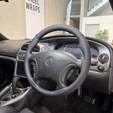 Holden Commodore VX/VT Series Steering Wheel Wrap – Black Leather (perforated top, smooth sides), Black stitch