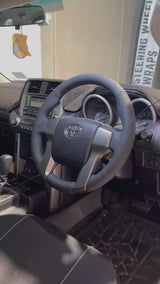 Toyota Prado 150 Series (2010–2015) Steering Wheel Wrap – Black Leather (smooth top, perforated sides), Black stitch